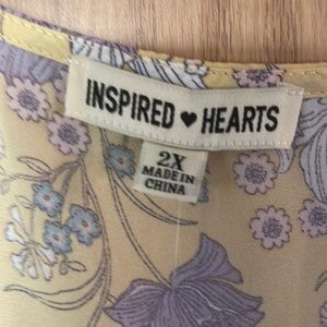 Yellow spring knee length dress with a low neckline with full back coverage